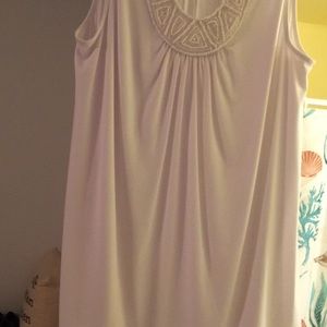Cute white sleeveless top with beaded front